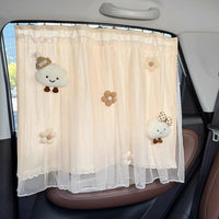 Car window shade blocks sun for infants.