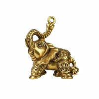 Brass elephant figurine, durable decor.